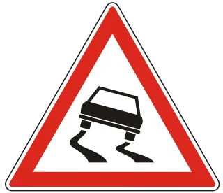 Csúszós úttest KRESZ-tábla